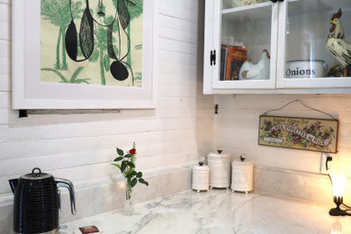 Kitchen - coastal kitchen idea in Other