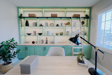 Inspiration for a large transitional freestanding desk carpeted, beige floor and wallpaper home office library remodel in Los Angeles with beige walls