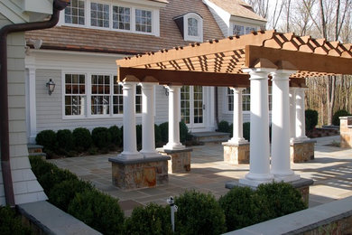 Example of a classic patio design in New York