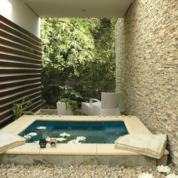 Contemporary Asian-Inspired Stone Jacuzzi and Relaxation Space
