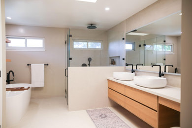 Bathroom - large mid-century modern master beige tile and ceramic tile ceramic tile, beige floor and double-sink bathroom idea in San Francisco with flat-panel cabinets, light wood cabinets, a one-piece toilet, beige walls, a vessel sink, quartzite countertops, a hinged shower door, white countertops and a floating vanity
