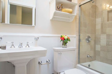 Bathroom - mid-sized transitional 3/4 beige tile, brown tile and ceramic tile ceramic tile bathroom idea in San Francisco with a one-piece toilet, beige walls and a pedestal sink