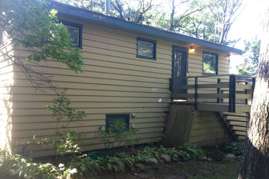 Example of an arts and crafts exterior home design in Other