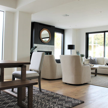 Striped Lounge Chairs and Black Shiplap Accent Wall