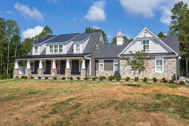 Inspiration for a mid-sized craftsman gray two-story wood gable roof remodel in DC Metro