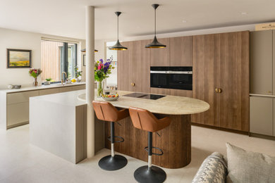 This is an example of a medium sized contemporary kitchen in Sussex.
