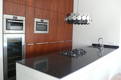 Example of an eclectic kitchen design in Amsterdam