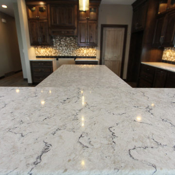 Cream Granite to Contrast Dark Cabinets