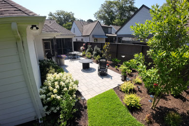 Inspiration for a modern concrete paver patio remodel in Other