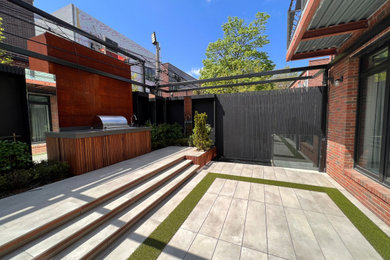 Patio - modern patio idea in New York