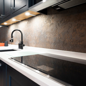 Decorative plasterwork creates a stunning splashback
