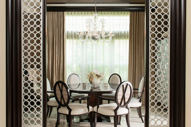 Enclosed dining room - large transitional marble floor enclosed dining room idea in Miami