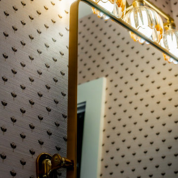 Transitional Guest Bathroom with Statement Tile, Wallpaper & Brass Fixtures