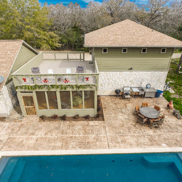 Aerial View of Guest House + Screened-in Porch with Upper Deck