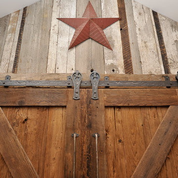 Barn siding, hand forged door track
