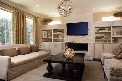 Inspiration for a large transitional enclosed carpeted family room remodel in Atlanta with beige walls, a ribbon fireplace and a wall-mounted tv