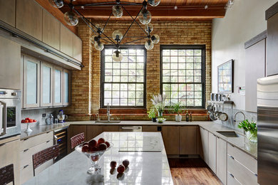 Large trendy u-shaped dark wood floor enclosed kitchen photo in Chicago with an undermount sink, flat-panel cabinets, gray cabinets, quartz countertops, gray backsplash, glass tile backsplash, stainless steel appliances and an island