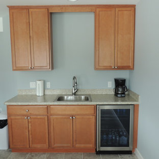 Inspiration for a medium sized traditional look-out basement in Detroit with grey walls, carpet and no fireplace.