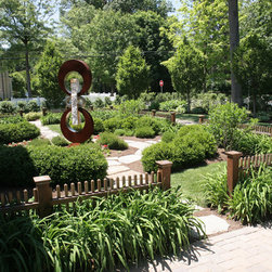 Abstract Metal Sculpture in Boxwood Garden - Garden Statues And Yard Art