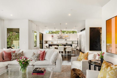 Living room - mid-sized modern enclosed dark wood floor and black floor living room idea in Austin with a bar, white walls, a ribbon fireplace, a tile fireplace and a wall-mounted tv