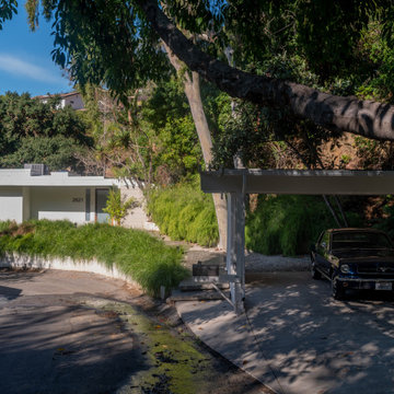 Hollywood Hills Mid-Century Home Exterior with Carport and Landscape