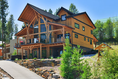 Inspiration for a traditional partial sun stone retaining wall landscape in Vancouver for winter.