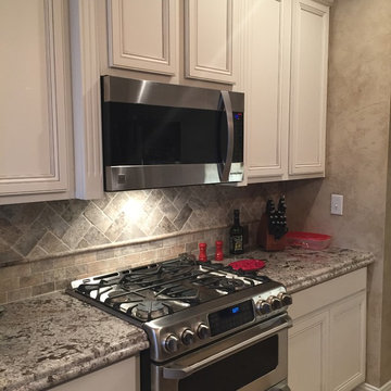 3cm Ogee Bullnose Countertop with Silver travertine tumbled backsplash