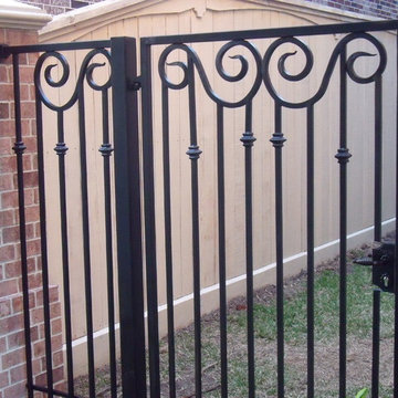 My Hand forged scroll fence
