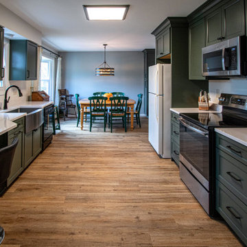 Painted Sage Kitchen with Carrara Breve Quartz countertops