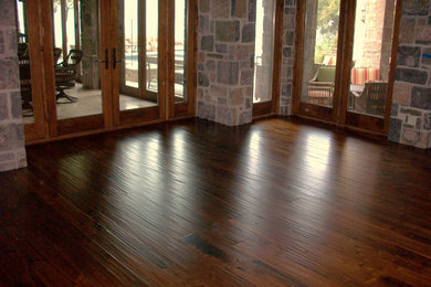 Elegant medium tone wood floor living room photo
