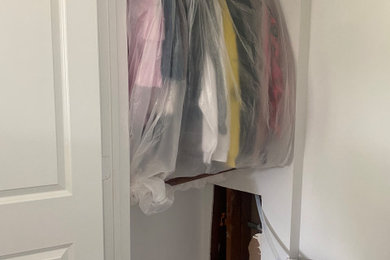 Inspiration for a mid-sized transitional closet remodel in Houston