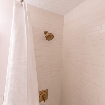 Playful Guest Bath Remodel with Fun Tile and Mixed Metals