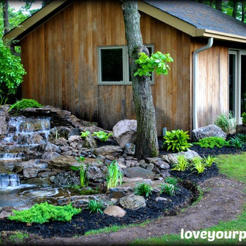 Moss Rock Koi Pond by Full Service Aquatics. Project site West Orange, NJ.