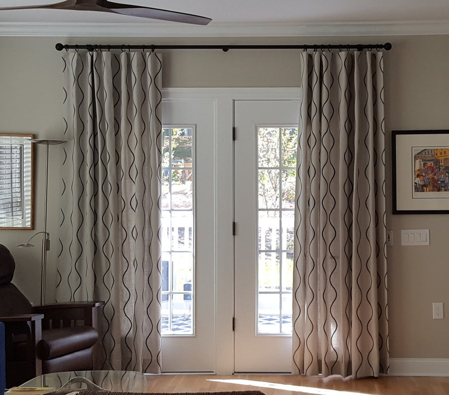 Embroidered drapes with glass hardware