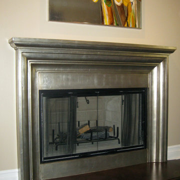 Silver leaf applied to fireplace mantel