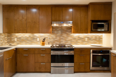 This is an example of a medium sized retro kitchen in New Orleans.