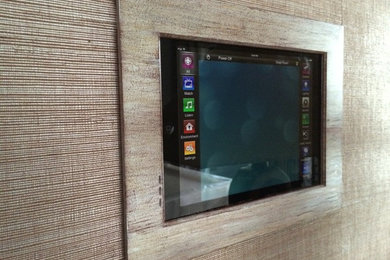 Minimalist home theater photo in Houston with beige walls