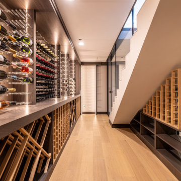 Custom Staircase Glass Wine Cellar & Display Cabinet in Newport Beach