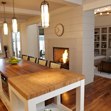 family room with fire place dividing