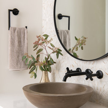 Wall mounted wide-spread faucets
