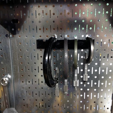 Calipers being held here by Wall Control's 8in Wide Accessory Hanger (PN