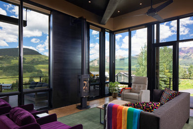 Living room - rustic living room idea in Denver