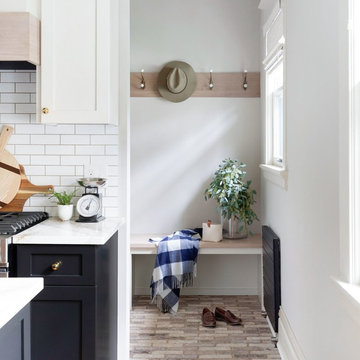 Chic, character-preserving kitchen remodel with Brittanicca Gold