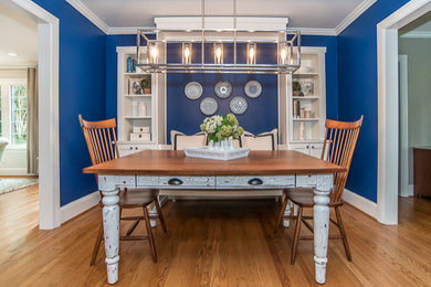 Example of a transitional dining room design in Raleigh
