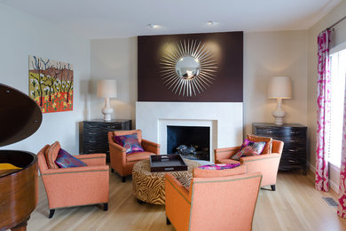 Mid-sized minimalist enclosed light wood floor and brown floor living room photo in Richmond with a music area, beige walls, a standard fireplace and a stone fireplace