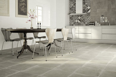 Inspiration for a transitional porcelain tile kitchen remodel in New York