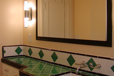 Photo of a mid-sized eclectic master bathroom in San Francisco with an undermount sink, white cabinets, an alcove tub, a corner shower, green tile, ceramic tile, beige walls and ceramic floors.