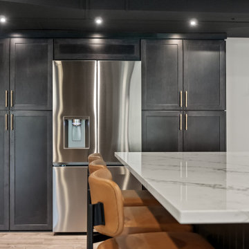 A Basement Built for Entertaining – With a Speakeasy Bar and Golf Simulator