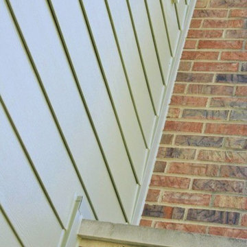 James Hardie Heathered Moss Plank Siding & Alside Aluminum Gutters in Naperville