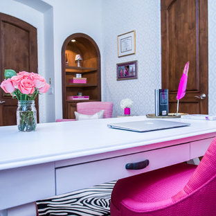 Inspiration for a large modern home studio in Phoenix with white walls, dark hardwood flooring and a freestanding desk.